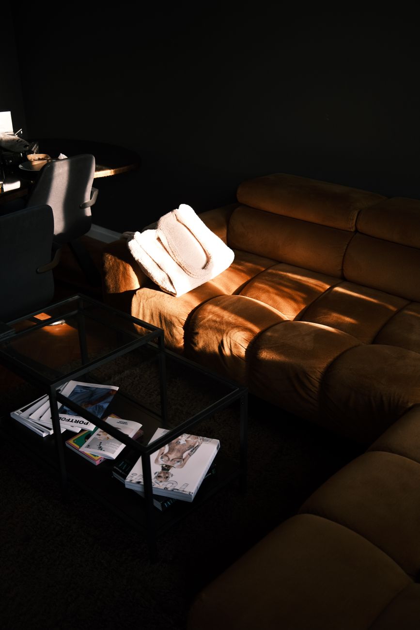 Welcoming living room with a soft sofa and warm lighting