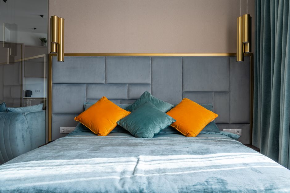 Elegant bedroom with soft cushions